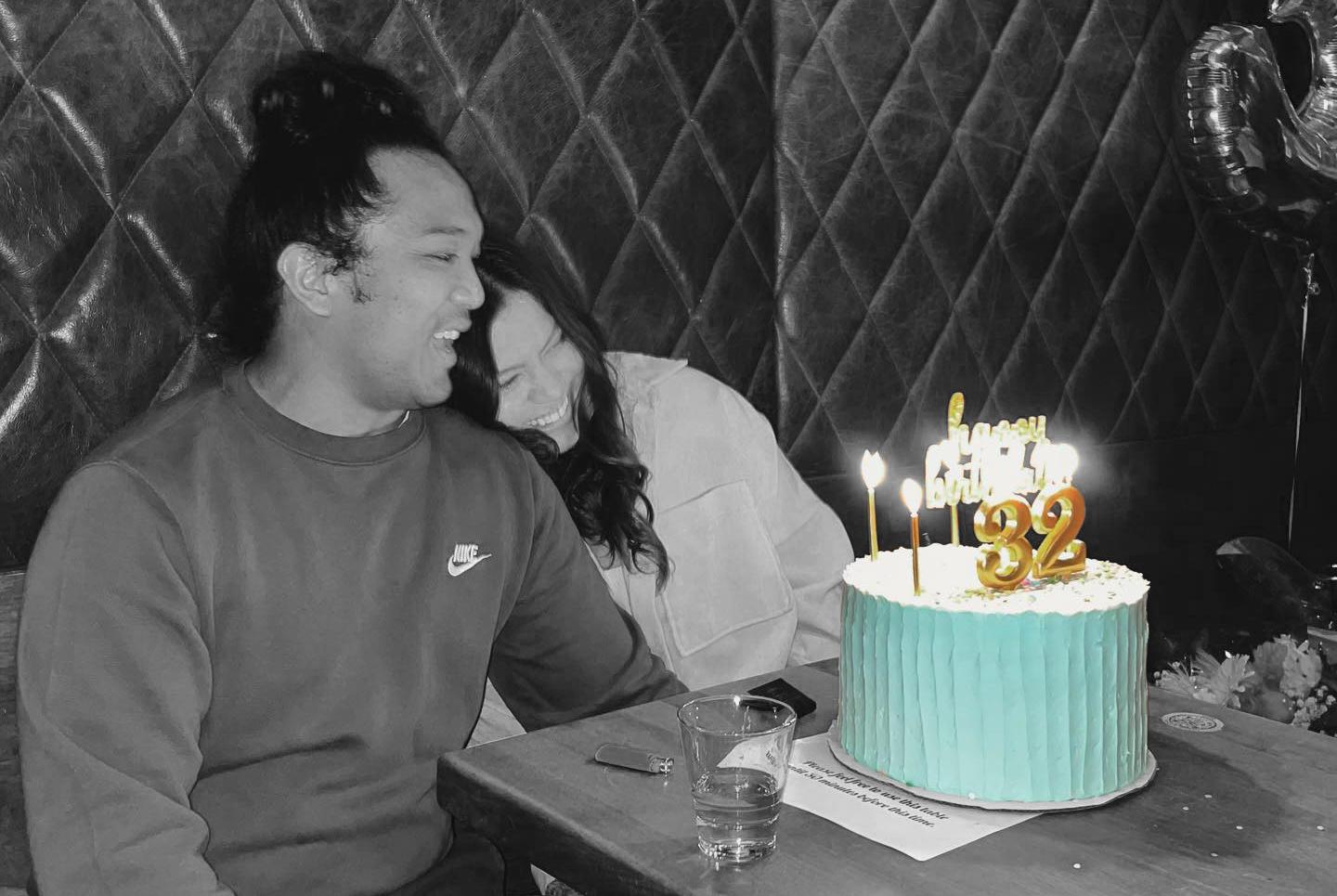 Couple Celebrating birthday with Celebration Cake