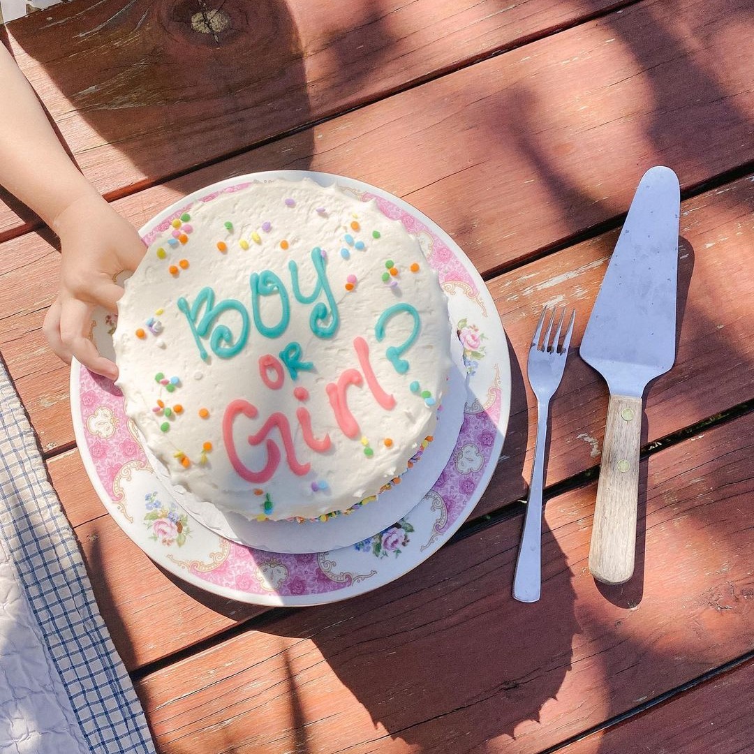 Boy or Girl? gender reveal cake not sliced. 