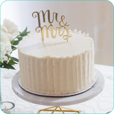 One tier white wedding cake with Mr. and Mrs. topper